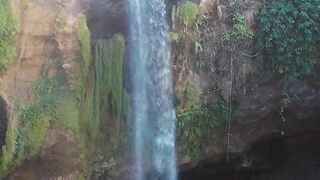 water-falls-off-a-rocky-mountain-cliff