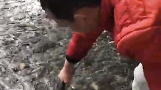 Fishing salmon fish by hand