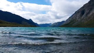 Beautiful Relaxing Sea Waves and Mountain Scene.