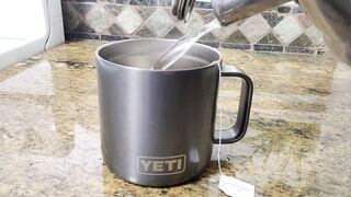 Amazon.com- YETI Rambler 14 oz Mug, Vacuum Insulated, Stainless Steel with MagSlider Lid, Navy - Home & Kitchen.ts