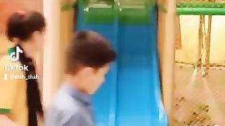 Cute boy playing in playland