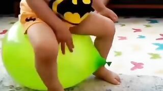 boy enjoy with balloon