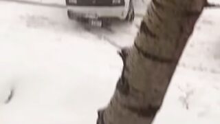 Cars slipping in snow