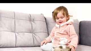 Cute baby meets new baby kittens for the first time!