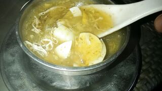 Little Boy selling chicken Soup with boiled eggs by Saqib Bin Yasin