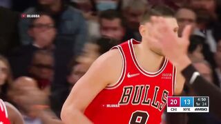 Alex Caruso behind the back pass for a Vucevic dunk over Julius Randle