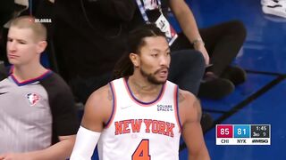 Derrick Rose sends Lonzo Ball's shot into the stands