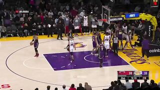 Dwight Howard commits a hard foul on Kyle Lowry and IMMEDIATELY went to help him up.