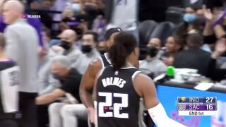 Buddy Hield with the spinning half court shot 