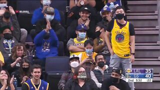 Jordan Poole crosses over Wayne Ellington and completes the nasty stepback over him