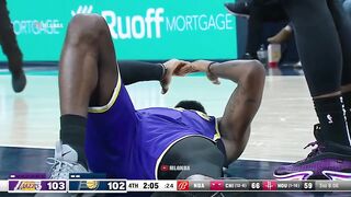 LeBron getting a cut above the eye after a foul from Sabonis
