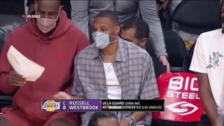 LeBron James and Russell Westbrook have fun on the bench