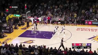LeBron James shocks entire Lakers bench with a crazy backwards dunk in transition 