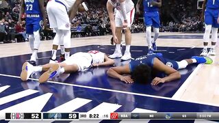 Nic Batum takes a hard fall after a collision with Karl Anthony-Towns