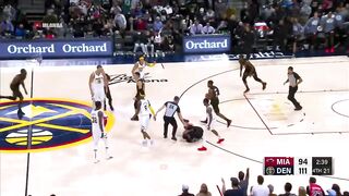 Nikola Jokic shoves Markieff Morris after Morris fouled him at halfcourt 