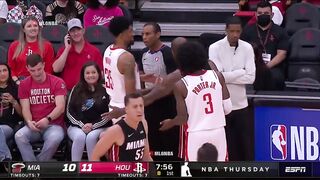 Stephen Silas snatches the ball away from PJ Tucker, allowing the Rockets to retaining possession