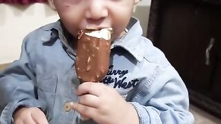 Ahmed is eating ice cream