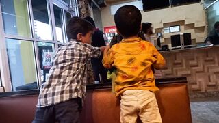 Kids Enjoying Pizza