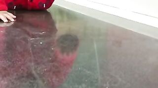 Cat walk by a cute baby.