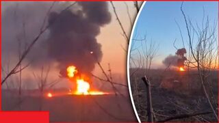 Russian armored vehicle shot with crew members inside