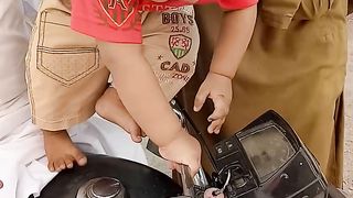 Baby boy not leaving bike