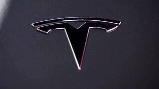 Tesla recalls almost half a million electric cars