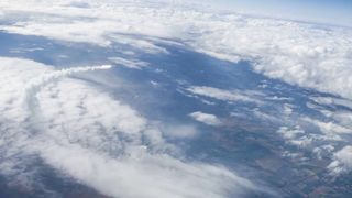 Ballistic missile Flying Above The Cloud