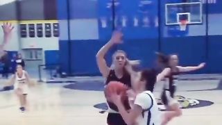Women palying basketball