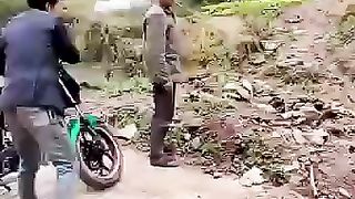 A man help poor person living in the mountains