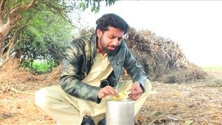 It's a lot of fun to eat potatoes like this in a place like this ۔ It is cooked and eaten in the village farm