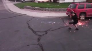 Lads Play Firecracker Tennis In Middle Of Street