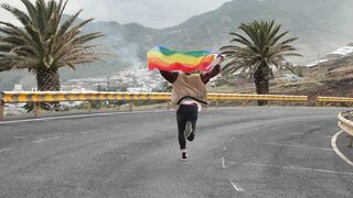 Running with a pride flag
