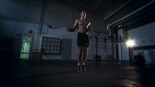 Man Jumping The Rope At The Gym