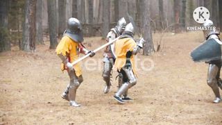 Medieval warriors fighting in a forest