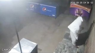 The thief was caught stealing.