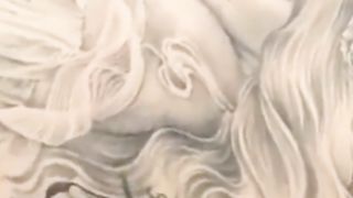 Amezing view of her back body tatoo