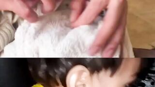 Cute baby playing with his father