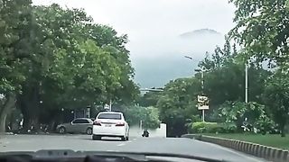 road to mountain which cover in cloud.