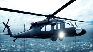 Military Halicopter Blackhawk Lands on an Aircraft Carrier