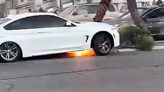 An Absolute insane scene on las vegas strip as car goes up in flame ,a man trapped inside