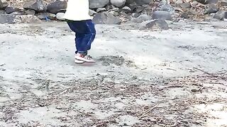 My daughter playing in the see
