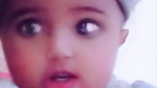 Cute baby talking with you