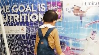Baby playing the football