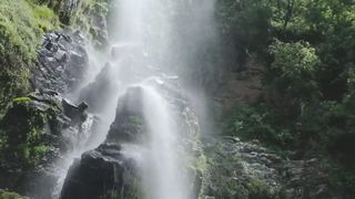 Beautiful natural water falling scene in forest.