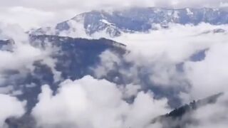 The sky's winter blanket of clouds and snow is so beautiful