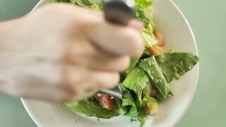 Eating salad with a fork