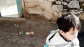Cute baby playing cricket