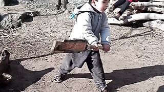 Cute baby playing cricket