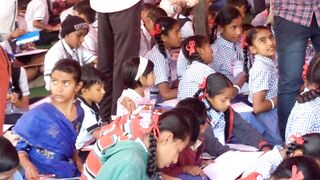 Children Giving Exams In Annual Function
