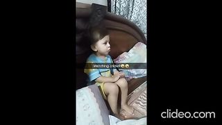 My son watching match